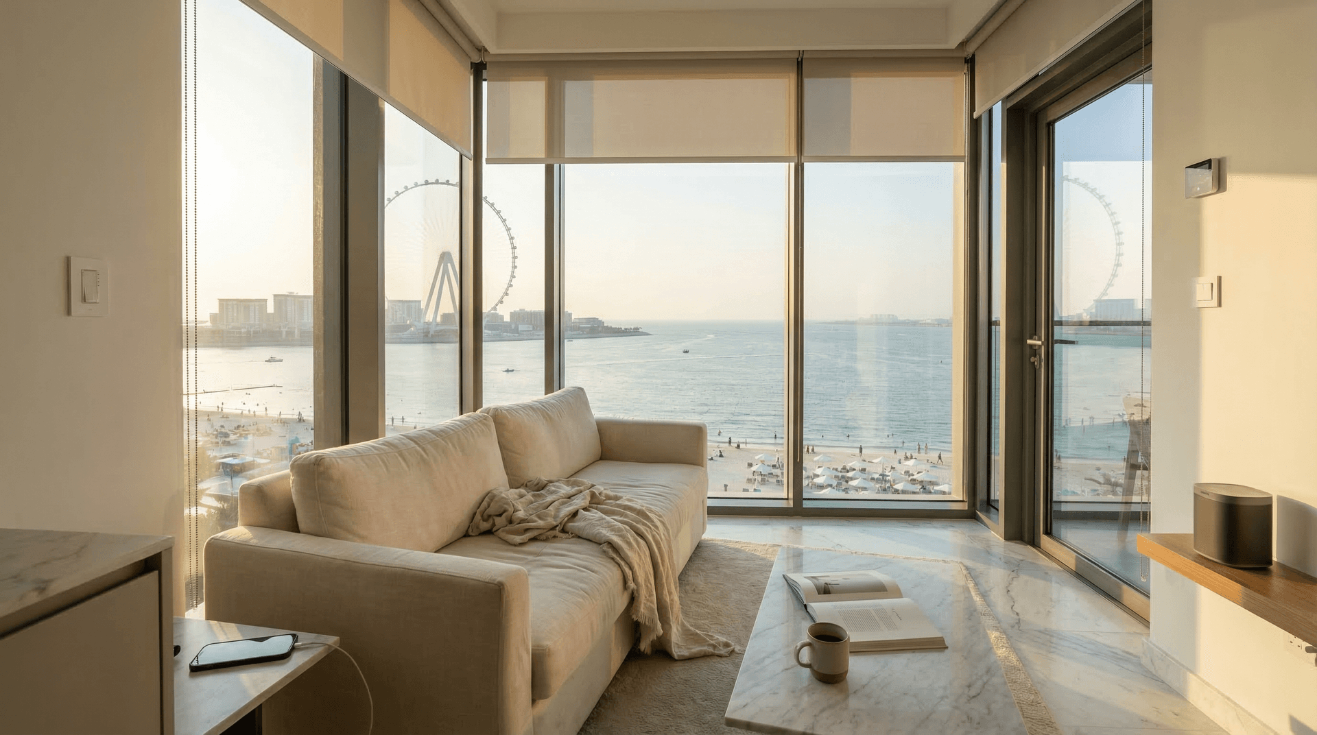 Smart home devices in a JBR beachfront apartment with Arabian Gulf views through floor-to-ceiling windows